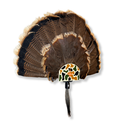 Turkey fan wall display mount in hunting room modern trophy display setup